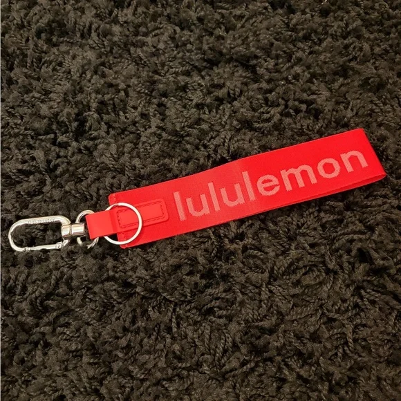 Lululemon Athletica Red Never Lost Keychain brand new never used - Picture 2 of 3